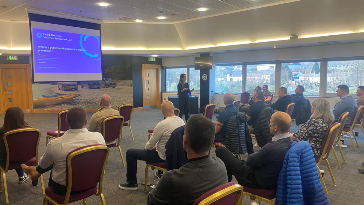 Image shows Lara Snowdon, Public Health Lead, presenting to South Wales Police and British Transport Police Violence Prevention Champions
